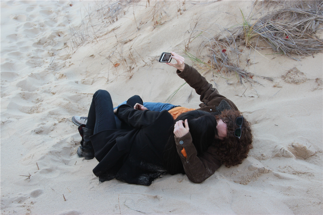 Play together in the sand.
